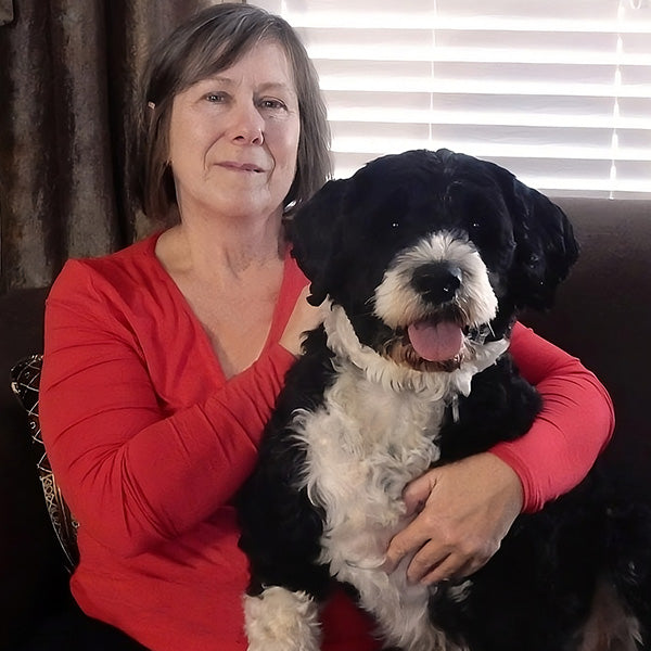 Martina Schumann, a certified dog nutritionist with her pet dog